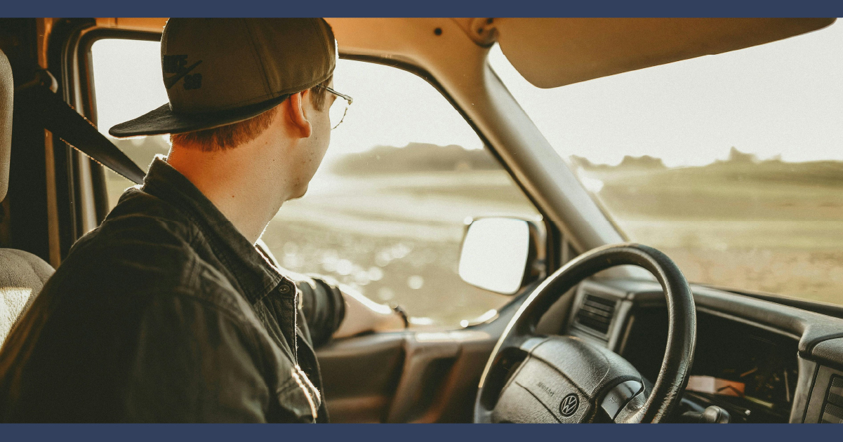 Man not paying attention to the road while driving