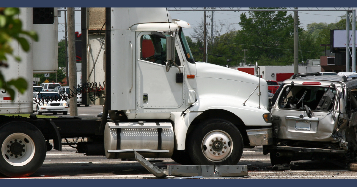 White truck cab after crashing into a car