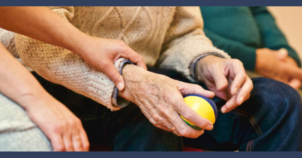 Person grabbing the hand of a elderly person