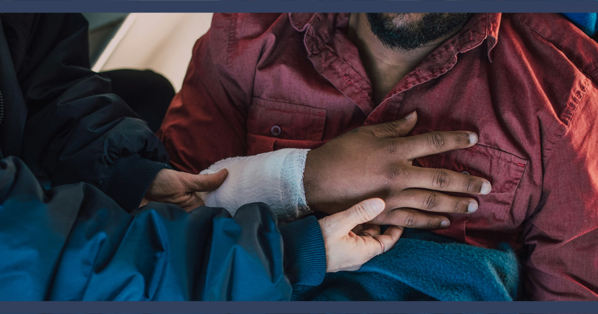 Man having his bandage attended to